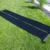 Solarmatten Poolheizung neben Rundpool im Garten